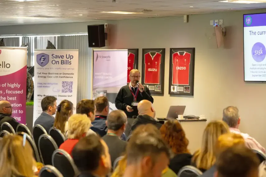 Photo of speaker, Lee Monroe of The HR Dept, South Wales delivering a presentation at the Big Breakfast in April'26